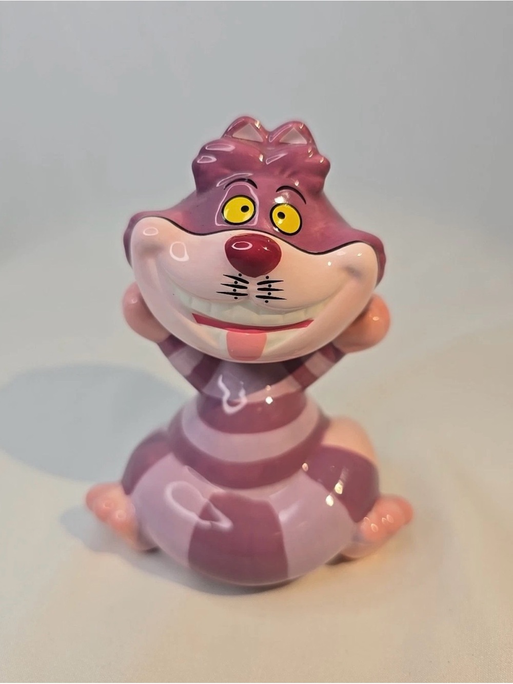 Disney Purple and Pink Striped Cheshire Cat Figurine salt and pepper